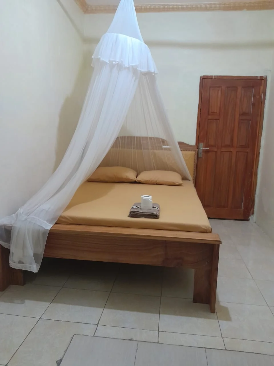 Fan room only, with private bathroom in Bunaken Homestay