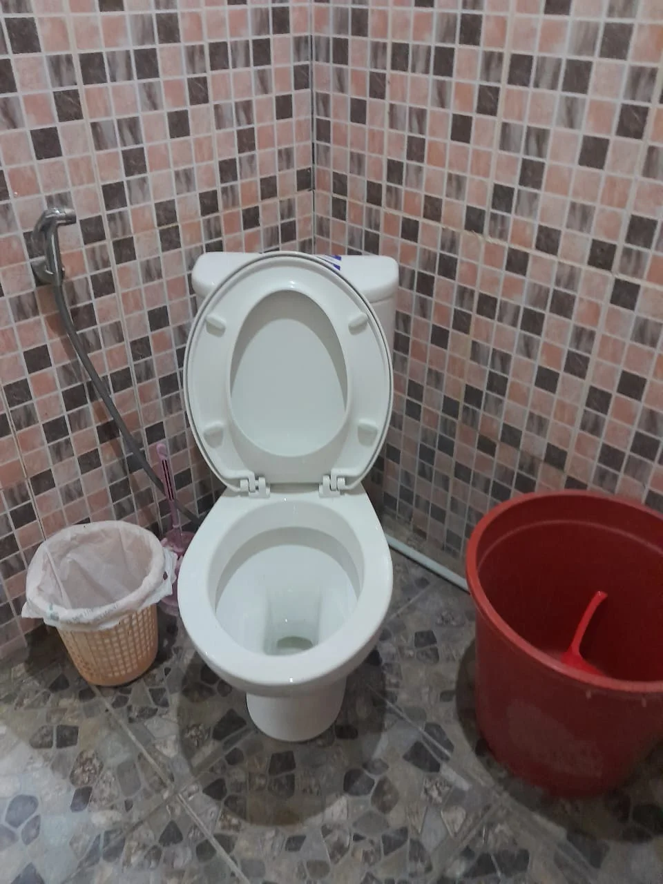 Western toilet in all rooms of Bunaken homestay
