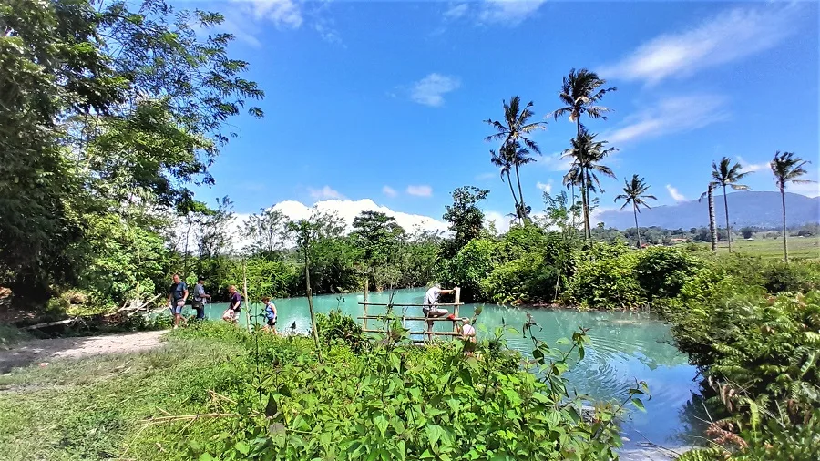 Having bath on Natural hotspring in Minahasa highland tours